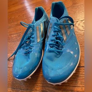 Racing spikes - men’s size 7/ women’s size 8.5